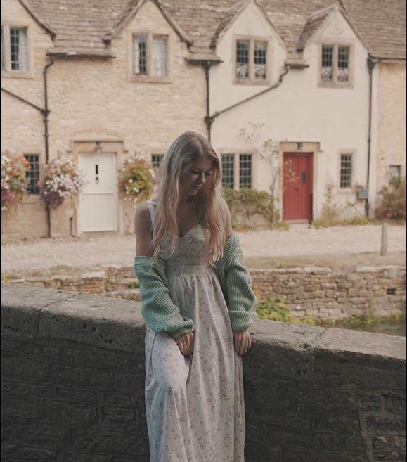 Soft light, quiet streets and cinematic movement — a portrait session captured in the heart of the Cotswolds.